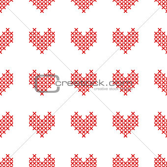 Seamless pattern with cross-stitch hearts on white