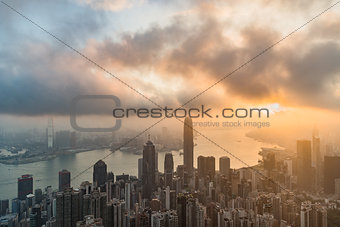 Famed skyline of Hong Kong from Victoria Peak in a foggy morning