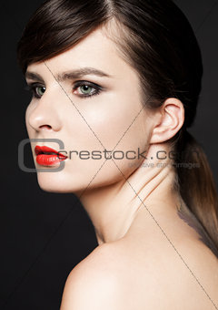 Beauty woman with red lips on black background