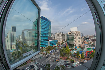 Traffic on city streets. Window view to Seoul, South Korea