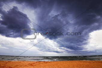 Power kite in sea and storm sky
