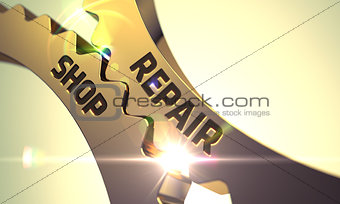 Golden Metallic Cogwheels with Repair Shop Concept.