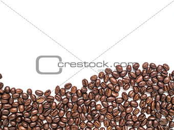 Isolated coffee beans arrange at the bottom in curve line shape 