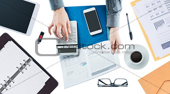 Business woman checking a financial report