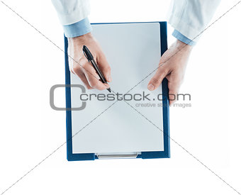 Doctor writing a prescription on a clipboard