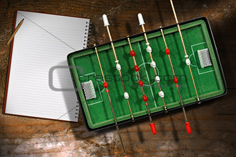 Mini Table Football Game with a Notebook