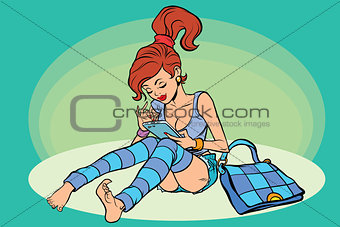 Young woman reading smartphone
