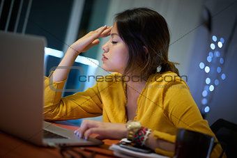 Girl College Student With Headache Studying At Night