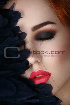 Beautiful girl with smoky eyes and red lips