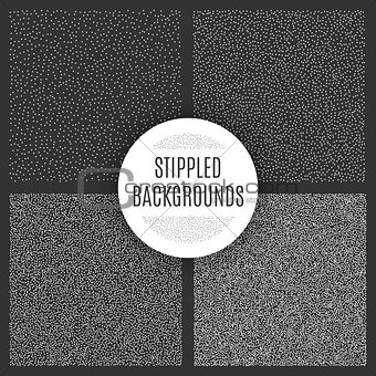 Set of black and white grainy dotwork textures. Retro halftone stippled backgrounds.