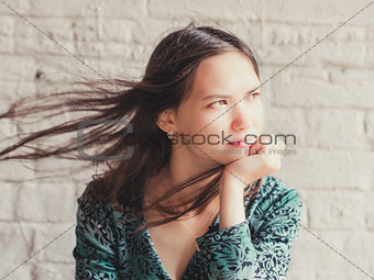 serious young woman looking away