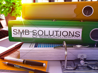 Green Office Folder with Inscription SMB Solutions. 3D Rendering.