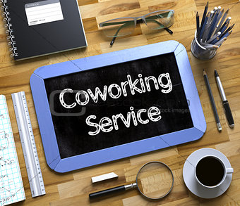 Coworking Service - Text on Small Chalkboard. 3D Rendering.