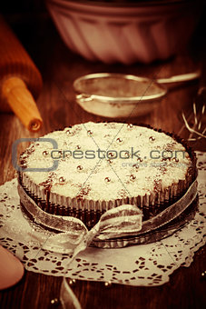 White and chocolate Christmas cake in vintage look
