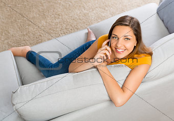 Young woman talking at phone