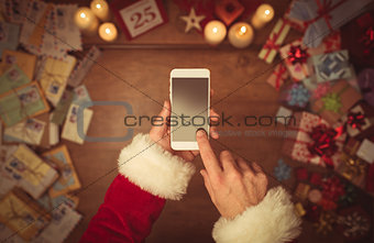 Santa Claus using a smart phone