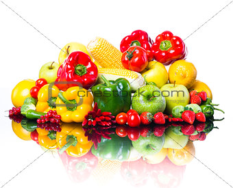 Healthy vegetables and fruits on white background