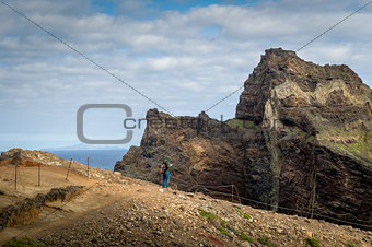 Tourists at the eastern cape, famous hiking trail of Madeira island