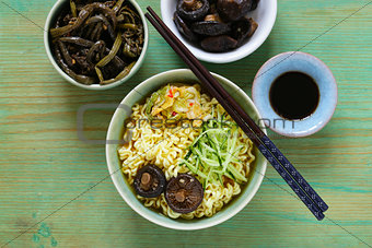 Asian food spicy ramen noodles with vegetables