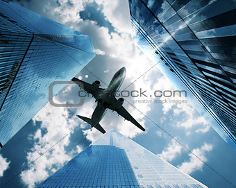 Aircraft between skyscrapers
