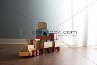 Wooden toy train on the floor