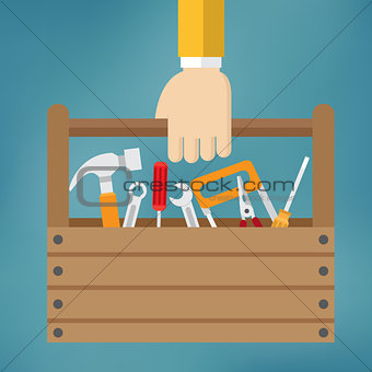 Hand with toolbox.