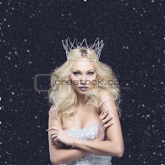 Beautiful woman dressed as winter queen