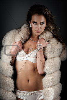 Sexy lingerie in fur coat