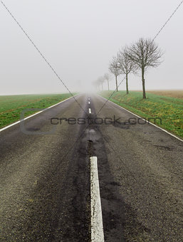 Road in fog leads to nothing