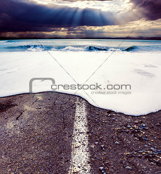Road and sea.Sea storm concept