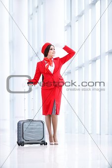 Smiling stewardess at airport