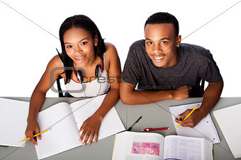 Two happy academic students studying together