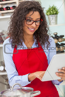 Happy Woman Cooking With Tablet Computer in Kitchen
