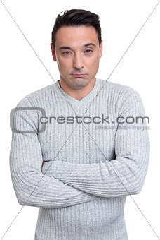 Serious man with arms folded