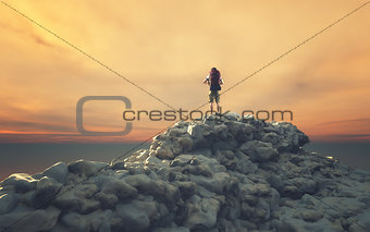 Man with backpack on a rock 