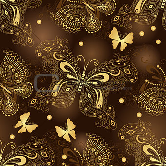 Seamless dark brown pattern with gold butterflies 