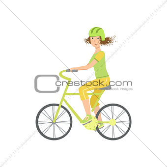 Woman Riding A Bicycle In Helmet