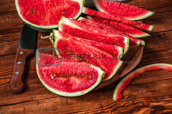 Watermelon slices lying on the cutting board