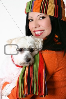 Female cuddling a pet dog