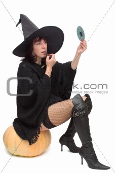 Pretty witch making up