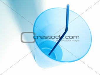 blue cup and straw