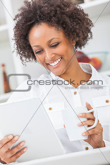 Mixed Race African American Girl Tablet Computer and Coffee