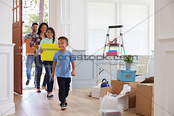 Hispanic Family Moving Into New Home
