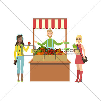 Vegetable Stand Of Farm Fresh Products With Seller And Customers