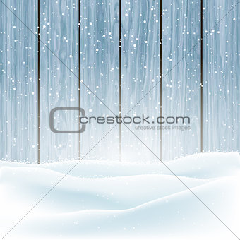 Winter snow on wood background 