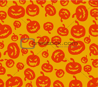 Seamless Halloween pumpkins background 