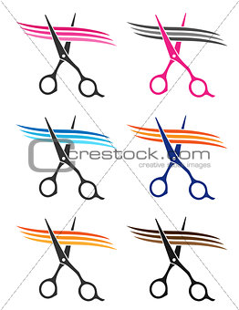 set of scissors cuttig hair strand
