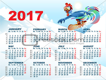 Blue Rooster on snowboard. Calendar with cock symbol 2017