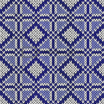 Seamless geometrical knitting pattern in blue and white