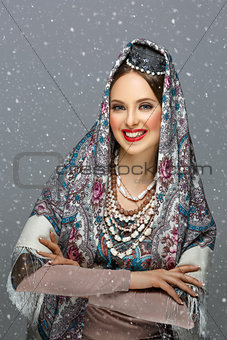 Beautiful russian girl in traditional clothes